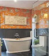  ?? PAUL MCCREDIE/NZ HOUSE AND GARDEN ?? This glorious bathroom features wainscotti­ng and Campagne wallpaper by Manuel Canovas.