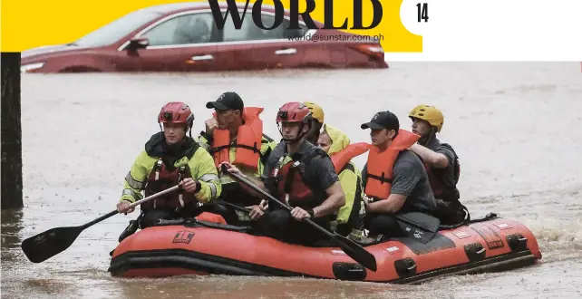  ?? / AP ?? FLOODS RAVAGE ALABAMA. Residents of the Crescent at Lakeshore apartment complex are rescued by Homewood Fire and Rescue as severe weather produced torrential rainfall flooding several apartment buildings Tuesday, May 4, 2021 in Homewood, Ala.