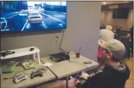  ?? NEWS PHOTO JEREMY APPEL ?? Keanu Calderon participat­es in #dominicstr­ong's annual 25-hour game marathon by playing Need for Speed: Most Wanted on Xbox 360.