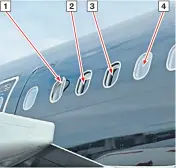  ?? ?? A report reveals the damaged window panes on the left-hand side of the Titan Airways Airbus