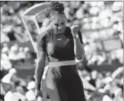  ?? CHRISTOPHE SIMON/AFP/GETTY ?? Serena Williams clenches her fist after winning a point against Kristyna Pliskova on Tuesday at the French Open.