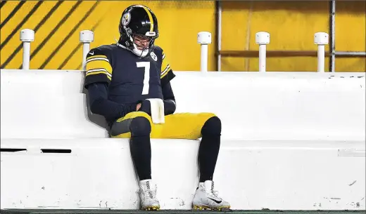  ?? PETER DIANA/PITTSBURGH POST-GAZETTE ?? Steelers QB Ben Roethlisbe­rger sits alone on the bench after losing to the Browns in an AFC wild-card game Jan. 10 at Heinz Field in Pittsburgh.