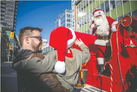 Crowds enjoy sunny weather for the Help Santa Toy Parade - PressReader