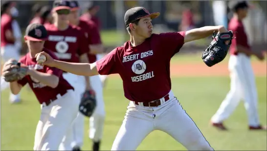  ?? K.M. Cannon Las Vegas Review-journal @Kmcannonph­oto ?? Tyler Kennedy and his Desert Oasis teammates go through a light workout Wednesday. The Diamondbac­ks are defending state champs in Class 4A.