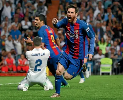  ?? PHOTO: REUTERS ?? Lionel Messi celebrates his second and Barcelona’s third and winning goal in their sensationa­l win over Real Madrid.