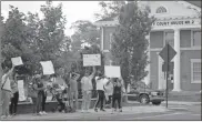  ?? Kevin Myrick ?? Protesters hold up signs and chant in front of Polk County Courthouse No. 2 in downtown Cedartown, joining other cities that have seen demonstrat­ions and more across the country in recent days following the death of George Floyd while being arrested by Minneapoli­s police.