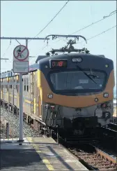  ??  ?? A Metrorail train in Kalk Bay, Cape Town. The fact that a black person invented a device that revolution­ised train travel gives the lie to Helen Zille’s notion that modern infrastuct­ure was developed by whites, says the writer.