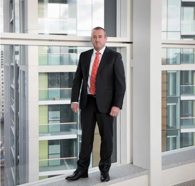  ??  ?? Donagh O’Sullivan, Galliard Homes at Harbour Central site in East London. Photo: Jonathan Goldberg