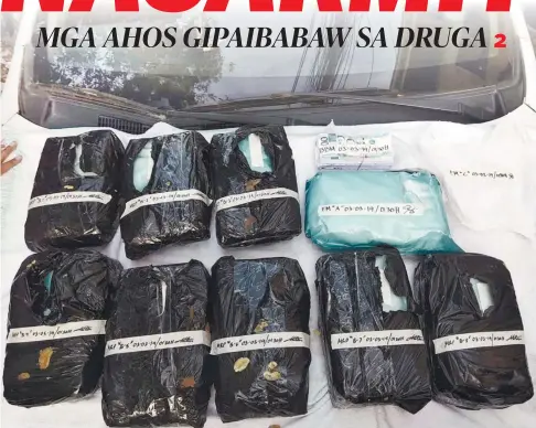  ?? / HULAGWAY GIKAN SA CCPO ?? ■ SHABU UG AHOS: Ang dagkong binulto nga shabu nga giapilan sa pagputos og mga ahos nasakmit sa hiniusang puwersa sa kapulisan gikan sa balay ni Elymar Ancajas, 24, sa Fatima Homes, Barangay Inayawan, dakbayan sa Sugbo, Dominggo, Marso 3, sa kaadlawon.