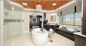  ??  ?? The Bristol’s 896-square-foot master suite features a spa-like ensuite bath.