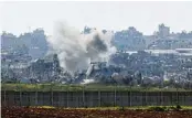  ?? /Reuters ?? War zone: Smoke rises after an explosion on Tuesday in Gaza, amid the conflict between Israel and Palestinia­n group Hamas. Talks are ongoing to secure a 40-day truce during which Israeli hostages would be freed and aid pumped into Gaza.
