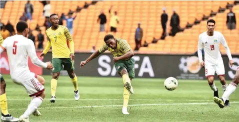  ?? | ITUMELENG ENGLISH ANA PICTURES ?? LEBO MOTHIBA, centre, scores for Bafana, during Saturday’s Africa Cup of Nations qualifier against the Seychelles at the FNB Stadium.