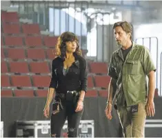  ?? SHOWTIME ?? Carla Gugino and Luke Wilson are former lovers working backstage with a rock band in “Roadies,” Cameron Crowe’s latest project. Imogen Poots also stars in Showtime show.