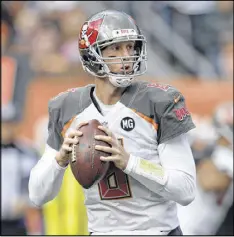  ?? AP FILE ?? QB Mike Glennon, who was 5-13 as a starter in Tampa Bay before losing his job to Jameis Winston, is expected to earn $14 million to $15 million per season in Chicago.