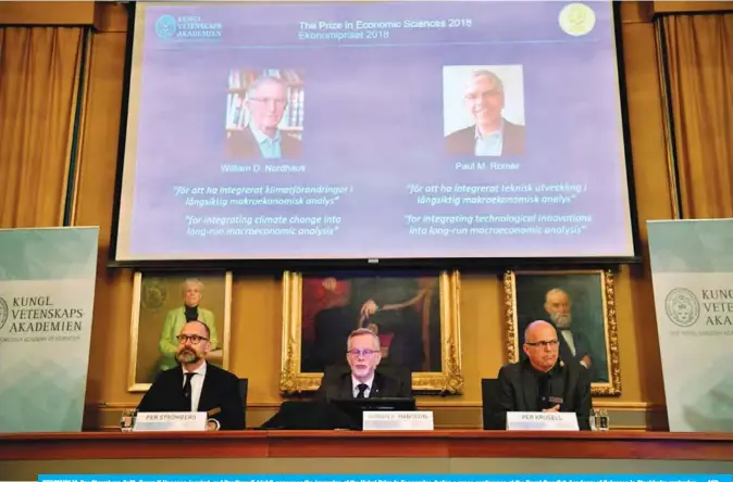  ??  ?? STOCKHOLM: Per Stromberg (left), Goran K Hansson (center) and Per Krusell (right) announce the laureates of the Nobel Prize in Economics during a press conference at the Royal Swedish Academy of Sciences in Stockholm yesterday.