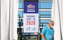  ?? PATRICK SEMANSKY/AP ?? Preparatio­ns take place for the first presidenti­al debate Sunday in Cleveland. The debate between President Donald Trump and former Vice President Joe Biden is set for Tuesday.