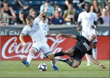  ?? DERIK HAMILTON — THE ASSOCIATED PRESS FILE ?? Union defender Aurelien Collin, right, hasn’t played much this season. But the veteran is a reliable option at the back as the Union head toward the playoffs.