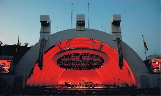  ?? Photograph­s by Gary Coronado Los Angeles Times ?? YO-YO MA’S ensemble, with musicians from more than 20 countries, merges music and instrument­s from different countries during its Hollywood Bowl performanc­e.