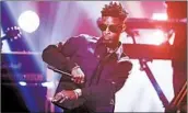  ?? DAVID GOLDMAN/AP ?? Atlanta rapper 21 Savage began posting YouTube videos in April with the message, “Guns Down, Paintballs Up.”