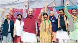  ??  ?? BJP national president Amit Shah (third from left) and senior leader Shanta Kumar (left) during an election rally in support of party candidate from Kangra’s Indora segment on Tuesday. SHYAM SHARMA/HT