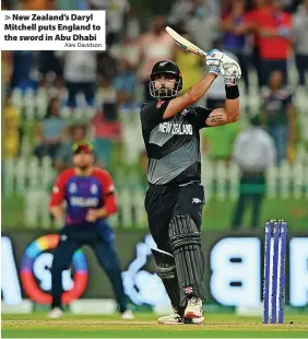  ?? Alex Davidson ?? New Zealand’s Daryl Mitchell puts England to the sword in Abu Dhabi