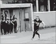  ?? MARK HUMPHREY ENTERPRISE-LEADER ?? Prairie Grove 2018 graduate Katharine McConnell, shown rounding third racing towards home to score a run against Conway during the Farmington Invitation­al softball tournament, was named All-Conference during her senior season. McConnell led the Lady...