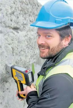  ?? Pictures: David Nash/Brighton University/PA. ?? Jake Ciborowski analysing a Stonehenge sarsen lintel stone.