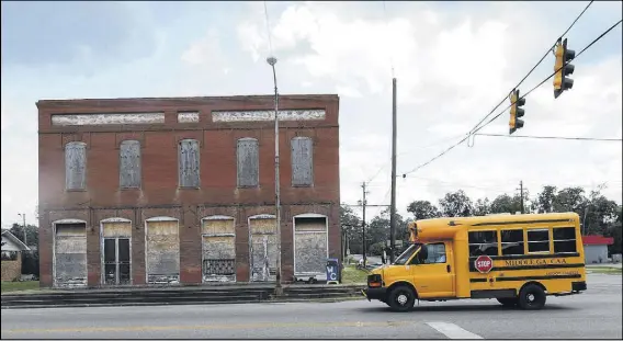  ?? JOHNNY CRAWFORD / JCRAWFORD@AJC.COM ?? Rural school districts, such as the one in Wilcox County, will get much less extra education funding from the state next year than districts in larger counties, particular­ly Gwinnett, Clayton and Paulding.