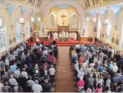  ?? MIKE TOWNS/SPECIAL TO THE EXAMINER ?? A Mass marked the 125th anniversar­y of St. Joseph's Church in Douro .