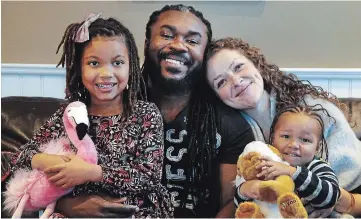  ?? CLIFFORD SKARSTEDT EXAMINER ?? Cayo Whyte, MC for Black History
Month in Peterborou­gh, with his wife Kimberly Lansdowne and daughters Zorah, 3, and Yahannah, 6, at their Lakefield home on Thursday.