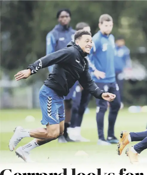  ??  ?? 0 James Tavernier, left, and Andy Halliday are put through their paces at training ahead of Rangers’ Europa League clash tonight. Left, a relaxed Steven Gerrard faces the media.