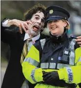  ?? Photo by Valerie O’Sullivan ?? In Good Spirits…Garda Stephanie Treyvaud, encounters Zombie Man at the 2018 Killarney St Patrick’s Festival Parade in the town on Saturday afternoon.