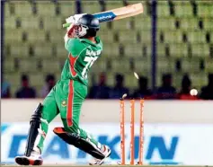  ??  ?? Shakib Al Hasan misses and is bowled,