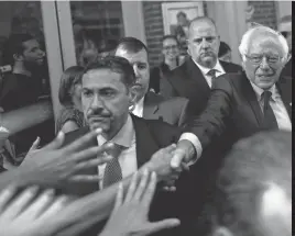  ?? KENA BETANCUR, AFP/ GETTY IMAGES ?? Bernie Sanders greets supporters in New York last month. He also “endorsed” a USA TODAY reporter.