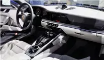  ??  ?? The 2020 Porsche 911 sports an all-new interior.