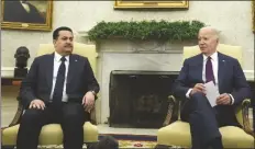  ?? ALEX BRANDON/AP ?? PRESIDENT JOE BIDEN (RIGHT) meets with Iraq’s Prime Minister Shia al-sudani in the Oval Office of the White House on Monday in Washington.