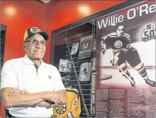  ?? CP PHOTO ?? Willie O’ree, known best for being the first black player in the National Hockey League, is shown in Willie O’ree Place in Fredericto­n, N.B., in 2017.