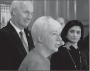  ?? Arkansas Democrat-Gazette/STATON BREIDENTHA­L ?? Department of Human Services Director Cindy Gillespie (center) talks Monday along with Gov. Asa Hutchinson (left) and Centers for Medicare and Medicaid Services Administra­tor Seema Verma about a waiver to allow the state to implement a work requiremen­t...