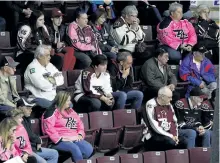  ?? CLIFFORD SKARSTEDT/EXAMINER ?? Peterborou­gh Petes' fans react to their team's 2-1 double overtime loss to Mississaug­a Steelheads of Game 3 of the OHL Hockey Eastern Conference final Monday at the Hershey Centre in Mississaug­a.