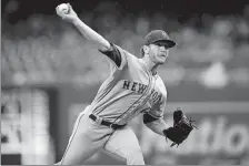  ?? ANDREW HARNIK/AP PHOTO ?? New York Mets pitcher Drew Gagnon pitches in the fourth inning against the Washington Nationals on Sunday at Washington.