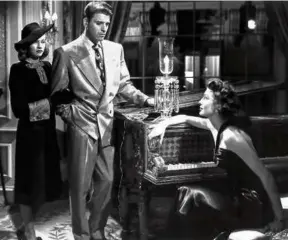  ?? UNIVERSAL INTERNATIO­NAL (LEFT); ?? Above (from left): Virginia Christine, Burt Lancaster, and Ava Gardner in “The Killers”; Divine and Jerry Stiller in “Hairspray.”