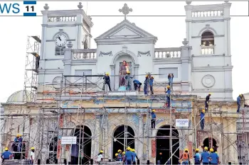  ??  ?? Reconstruc­tion work being carried out by the Navy at St Anthony's church in Kochchikad­e on Saturday. Pic by Priyantha Wickramaar­achchi