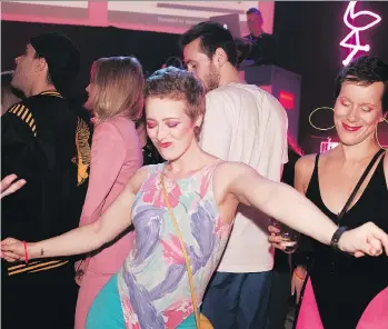  ??  ?? Attendees dance at Rethink Breast Cancer’s Boobyball in 2017. This year’s theme is the Wild West.