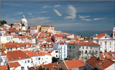  ?? (Rick Steves) ?? Breathtaki­ng views are bountiful in this city of red-tiled roofs on the yawning mouth of the Tejo River.