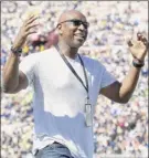  ?? Harry How / Getty Images ?? Fomer running back Eric Dickerson leads Pro Football Hall of Famers who’ve demanded health insurance and a share of NFL revenues.