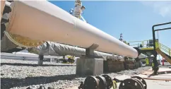  ?? DALE G YOUNG / DETROIT NEWS VIA THE ASSOCIATED PRESS FILES ?? Fresh bolts and fittings are ready to be added to the pipeline near St. Ignace, Mich., as Enbridge prepares a 2017 test of the Line 5 pipeline under the Straits of Mackinac.