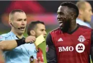  ?? FRANK GUNN/THE CANADIAN PRESS ?? The cards were flying during Sunday’s Eastern semifinal decider at BMO Field, where Jozy Altidore also saw red.