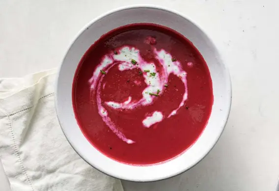  ?? Photos by David Malosh, © The New York Times Co. ?? Beet Soup With Tarragon, Chives and Yogurt.