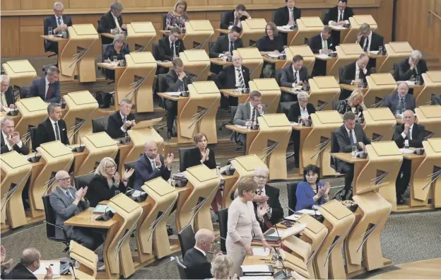  ??  ?? 0 It has been claimed agreements on devolution could break down as Holyrood and Westminste­r argue over who should gain powers reclaimed from Brussels after Brexit