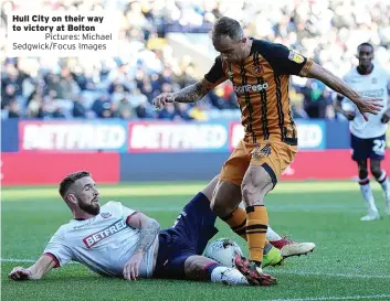  ??  ?? Hull City on their way to victory at BoltonPict­ures: Michael Sedgwick/focus Images
